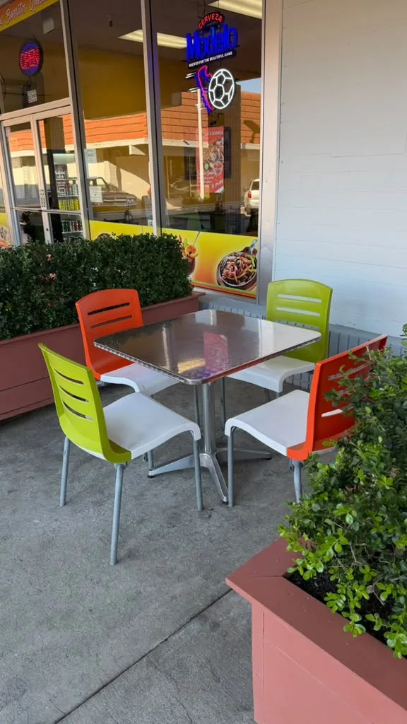 Outdoor seating by the windows