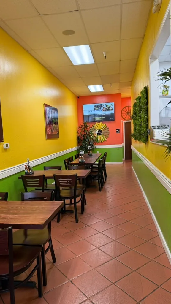 Dining room with yellow and green walls